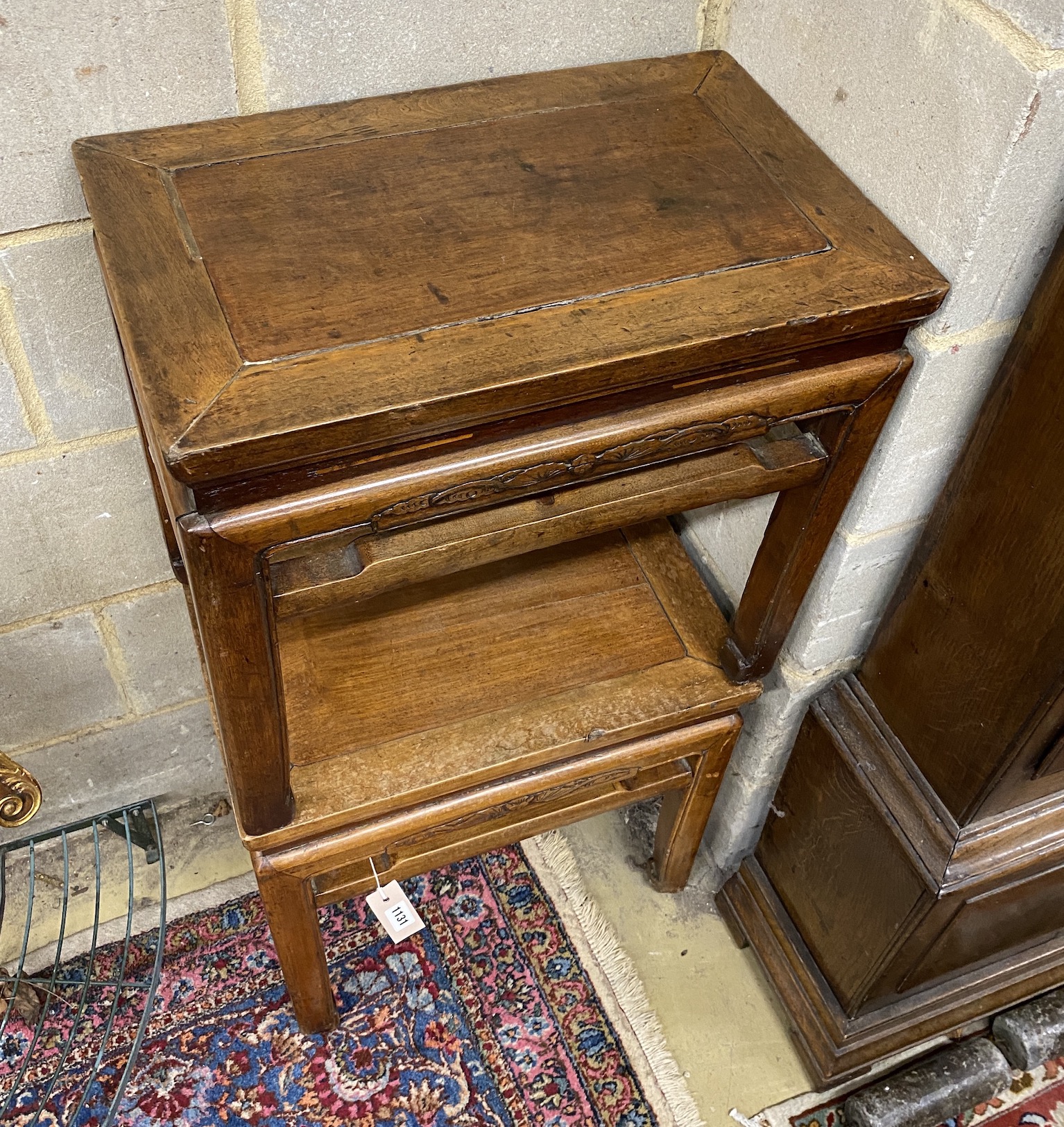 A pair of Chinese hardwood low tables, width 54cm, depth 34cm, height 50cm